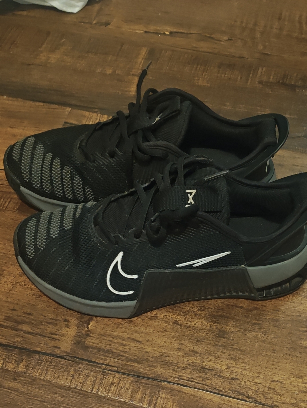 Nike Men’s Black Athletic Shoes with White Swoosh and Gray Sole